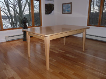 Solid Maple Dining room Table with extendable leaves